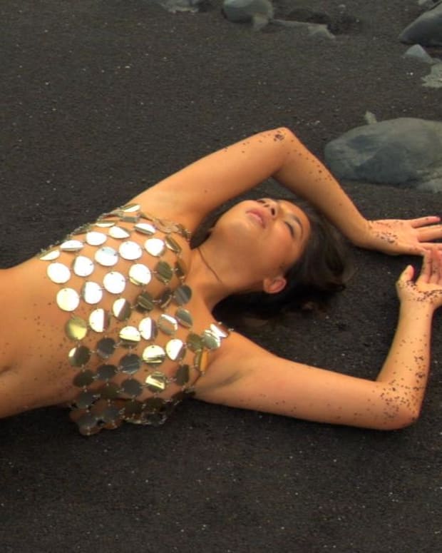 Cintia Dicker gets dirty during her SI Swimsuit shoot